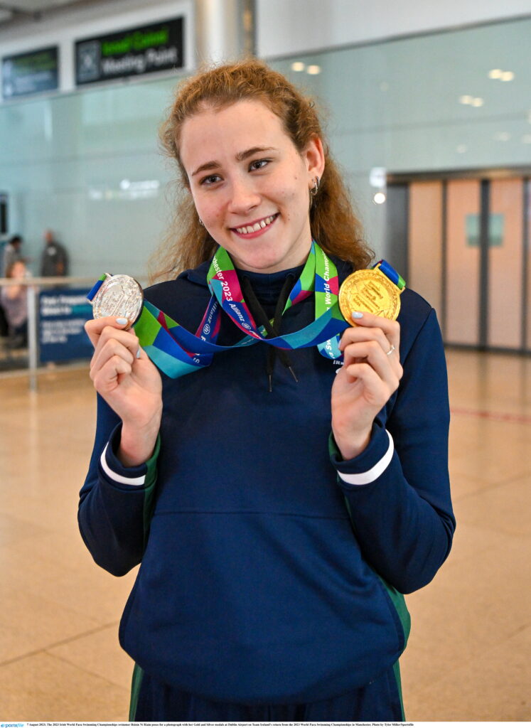 Roisin with medals from Paralympic medals 2023 